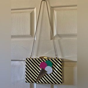 Kate Spade Ice Cream Cone handbag with metal strap and brass bow closure